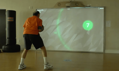 Resident participating in interactive exercise class.