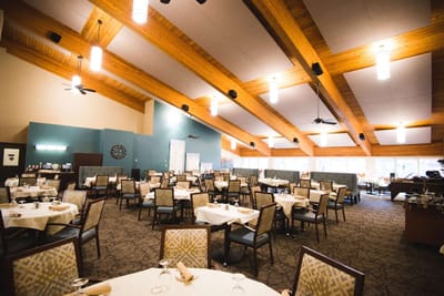 Dining area with tables set for meals