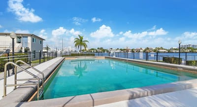 Swimming pool with waterfront view
