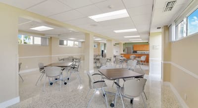 Interior dining room with tables and chairs