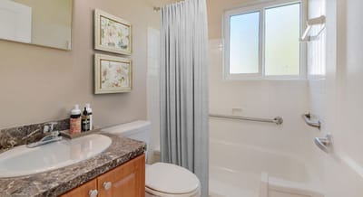 Bathroom with modern fixtures and decor