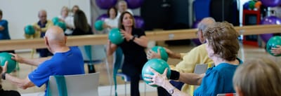 Residents participating in a group exercise class