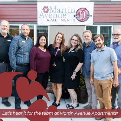 Staff team celebrating at Martin Avenue Apartments