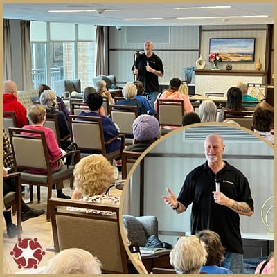 Engaging speaker presenting to residents in a cozy common area.