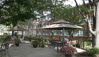 Outdoor area with seating and greenery