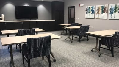 Interior meeting room with tables and chairs