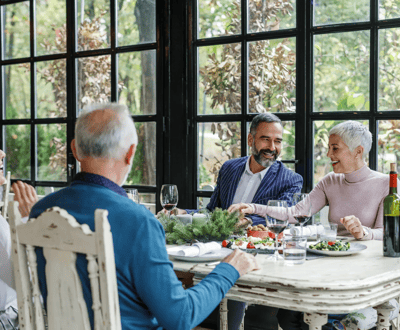Residents enjoying a meal together in a dining area.