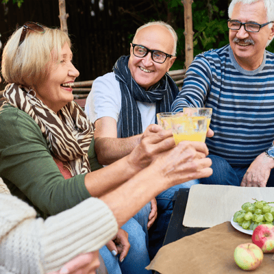 Residents enjoying a toast outdoors