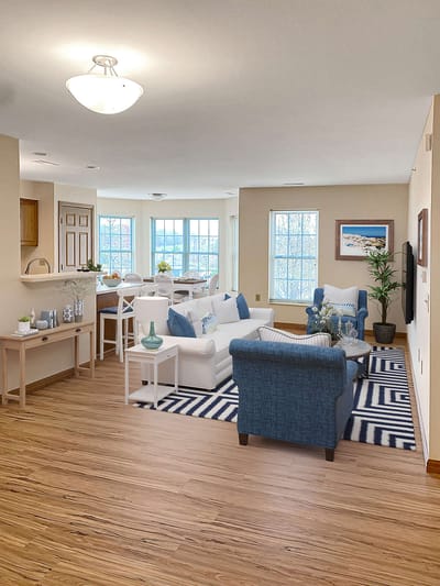 Bright, inviting common area with seating and decor.