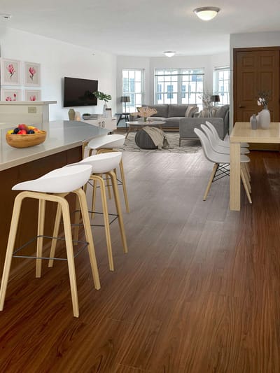 Modern common area with kitchen and living space.
