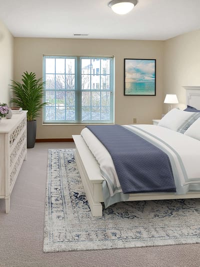 Bright and welcoming resident room with cozy decor.