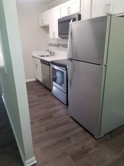 Modern kitchen with stainless steel appliances