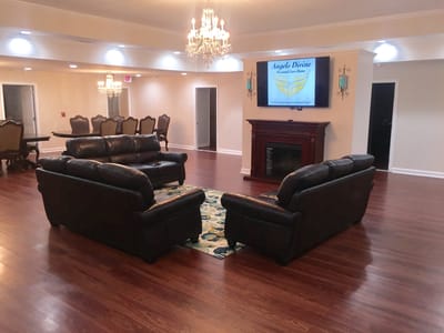 Common area with seating and a television