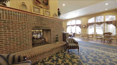 Cozy common area with a fireplace and seating