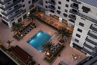 Aerial view of a swimming pool and outdoor lounge area