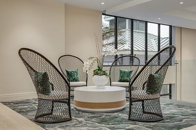 Brightly lit common area with stylish seating