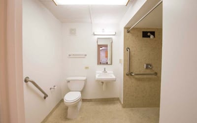 Clean, accessible bathroom with safety features