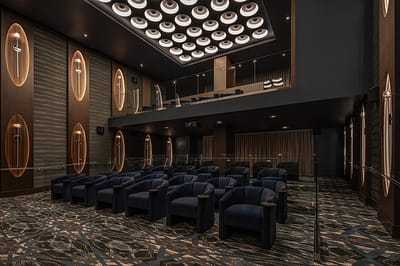 Interior view of a theater-like common area with seating