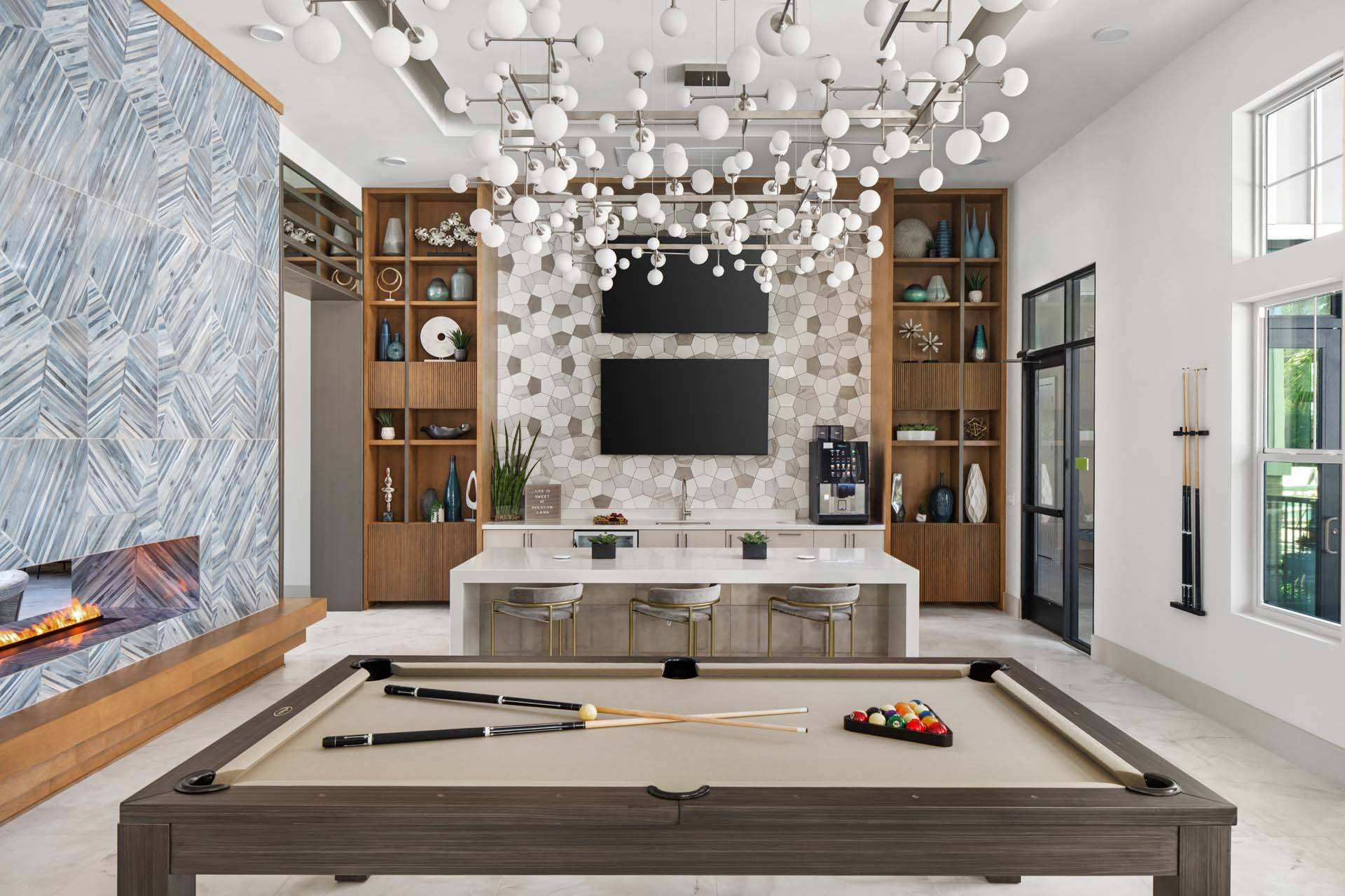 Interior common area with a pool table and modern decor