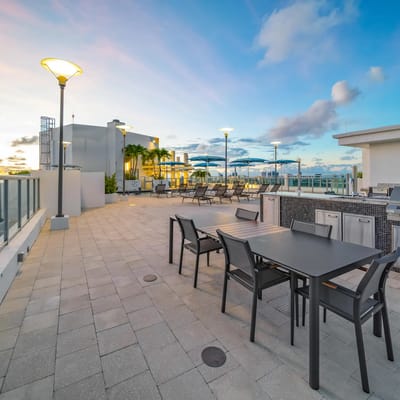 Outdoor patio area with seating and umbrellas