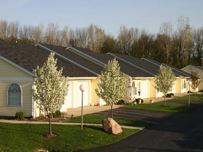 Exterior view of small residential cottages in a community setting