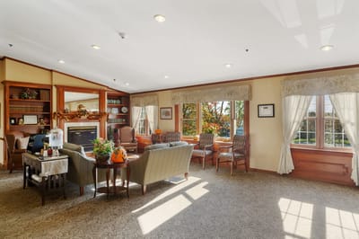 Bright common area with comfortable seating and autumn decorations