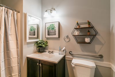 Brightly lit bathroom with modern decor