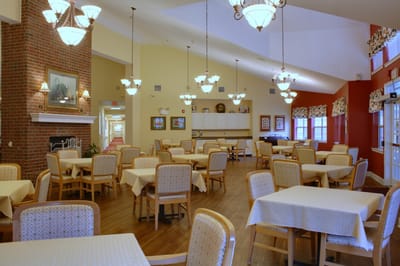 Bright dining area with tables and chairs