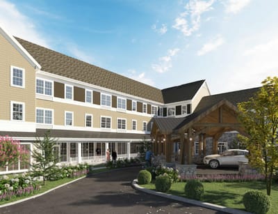 Exterior view of Ridgewood Senior Living with landscaped entrance