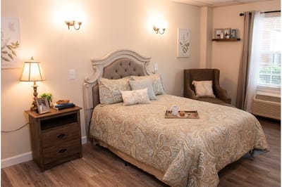 A cozy private resident room with decorative elements