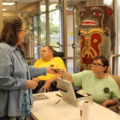 Residents interacting at a community event.