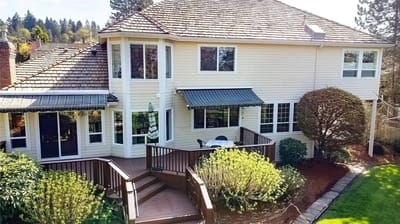 Exterior view of a senior care home's patio and garden