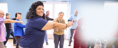 Residents participating in a group exercise class