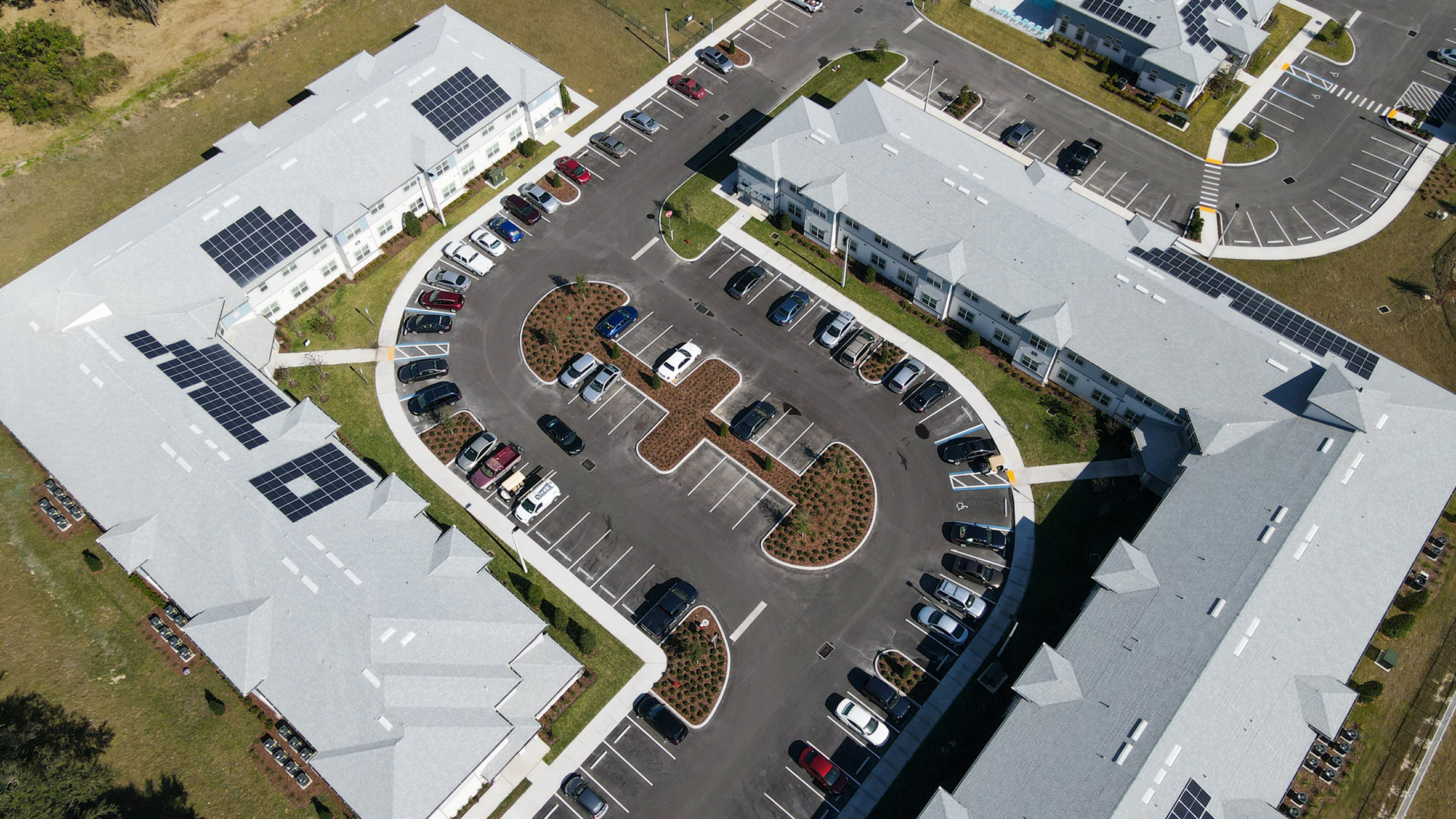 Aerial view of the facility's parking area and buildings