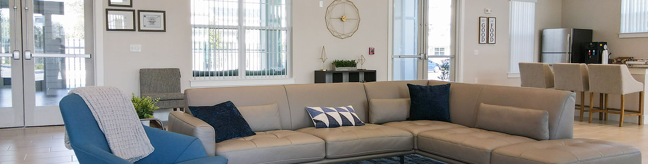 Bright, open common area with seating and decor