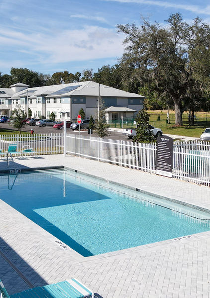 Swimming pool area with lounge chairs