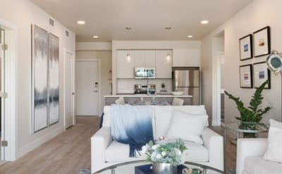 Modern interior living space with kitchen and seating area