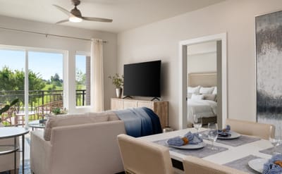 Bright, inviting living space with outdoor view