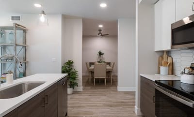Bright and modern common area with dining table