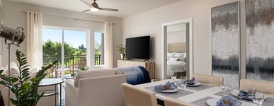 Modern interior view of a living space with dining area