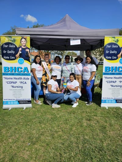 Group of staff posing at an outdoor event for Bena Home Care