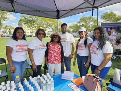 Group of staff at a community event outdoors