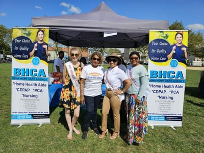 Staff interacting at an outdoor event for Bena Home Care.