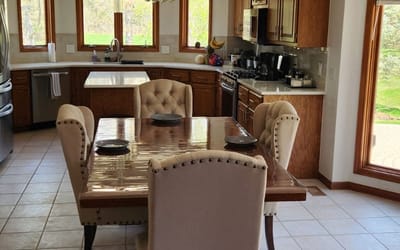 Bright dining room with wooden table and chairs