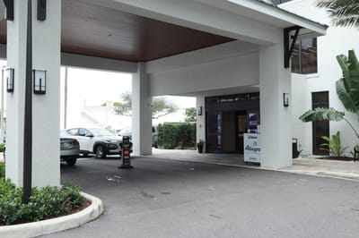 Entrance of Allegro Fort Lauderdale with vehicle parking