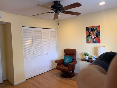 Cozy interior space with a chair and artwork