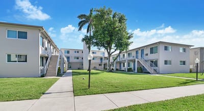 Exterior view of Gateway Terrace Senior Apartments with green space