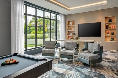 Bright common area with pool table and seating