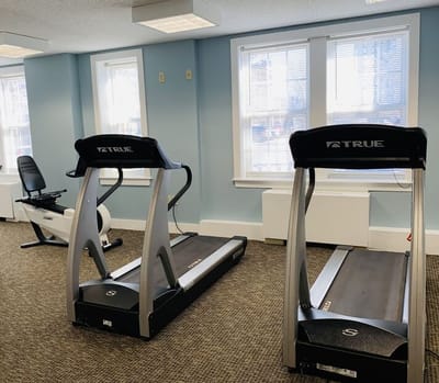 Fitness equipment in a well-lit activity room