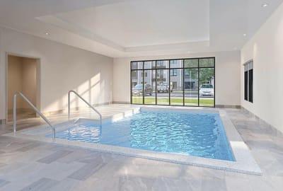 Indoor pool area with natural lighting